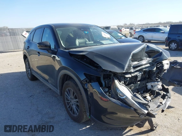 2020 Mazda CX-5 Touring with VIN JM3KFACM0L0780265, listed as a IAAI auction lot 41825873 with 151,888 mi miles. Bid and sale history available at carsss.com. Image 1.