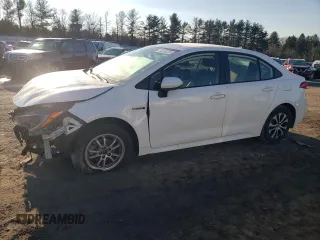2021 Toyota Corolla Hybrid LE with VIN JTDEAMDE5MJ011169, listed as a Copart auction lot 88752265 with 52,994 mi miles and Salvage Title. Bid and sale history available at carsss.com. Image 1.