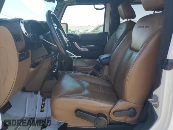 2015 Jeep Wrangler Rubicon Hard Rock z VIN 1C4BJWCG5FL561397, wystawiony jako Copart lot #61218185 z przebiegiem 164 240 mil mil oraz Czysty tytuł • Clean title. Historia ofert i sprzedaży dostępna na DreamBid. Obrazek 7.
