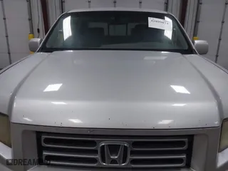2006 Honda Ridgeline RTL with VIN 2HJYK16546H520899, listed as a IAAI auction lot 41899874 with 3,202,741 mi miles. Bid and sale history available at carsss.com. Image 13.