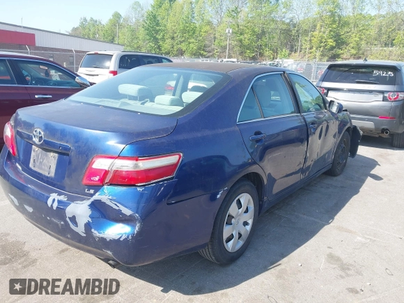 2009 Toyota Camry with VIN 4T1BE46K59U401572, listed as a IAAI auction lot 42059793 with 215,238 mi miles. Bid and sale history available at carsss.com. Image 4.
