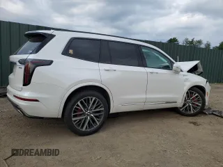 2022 Cadillac XT6 Sport with VIN 1GYKPGRS4NZ174846, listed as a Copart auction lot 64271474 with 57,891 mi miles and Salvage Title. Bid and sale history available at carsss.com. Image 3.