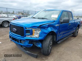 2019 Ford F-150 XL with VIN 1FTEX1EP3KFA11345, listed as a IAAI auction lot 42036915 with 136,608 mi miles. Bid and sale history available at carsss.com. Image 2.