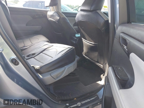 2021 Toyota Highlander L with VIN 5TDZZRAH2MS075954, listed as a IAAI auction lot 41711428 with 145,476 mi miles and . Bid and sale history available at DreamBid. Image 8.