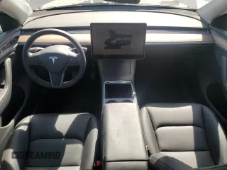 2024 Tesla Model Y Long Range with VIN 7SAYGDEE6RA321064, listed as a Copart auction lot 58889795 with 48,857 mi miles and Salvage title. Bid and sale history available at DreamBid. Image 8.