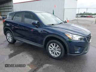 2016 Mazda CX-5 Sport with VIN JM3KE2BY0G0850298, listed as a IAAI auction lot 42107007 with 97,478 mi miles. Bid and sale history available at carsss.com. Image 1.