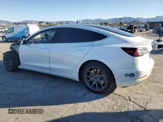 2020 Tesla Model 3 Long Range with VIN 5YJ3E1EB0LF665887, listed as a Copart auction lot 48985245 with 50,309 mi miles and Salvage Title. Bid and sale history available at DreamBid. Image 2.