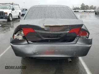 2009 Honda Civic LX z VIN 2HGFA16559H348516, wystawiony jako Copart lot #48715965 z przebiegiem 149 514 mil mil oraz Szkoda całkowita • Salvage title. Historia ofert i sprzedaży dostępna na DreamBid. Obrazek 6.