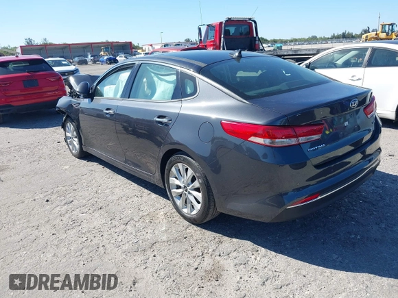 2018 Kia Optima EX with VIN 5XXGU4L36JG223501, listed as a IAAI auction lot 41722310 with 63,481 mi miles and . Bid and sale history available at carsss.com. Image 3.