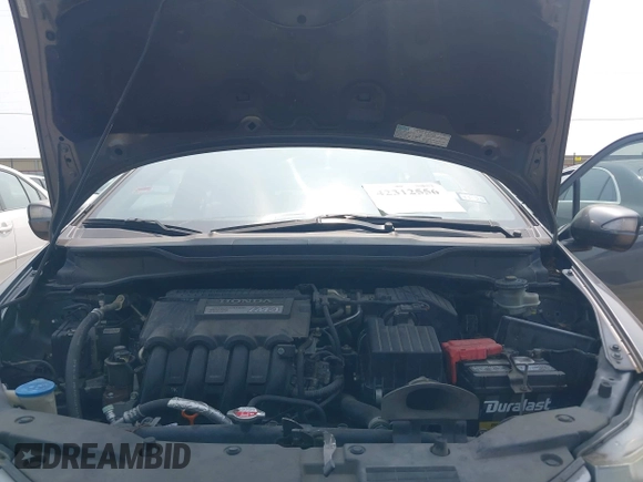 2010 Honda Insight EX with VIN JHMZE2H71AS043465, listed as a IAAI auction lot 42312556 with 151,009 mi miles and . Bid and sale history available at DreamBid. Image 10.