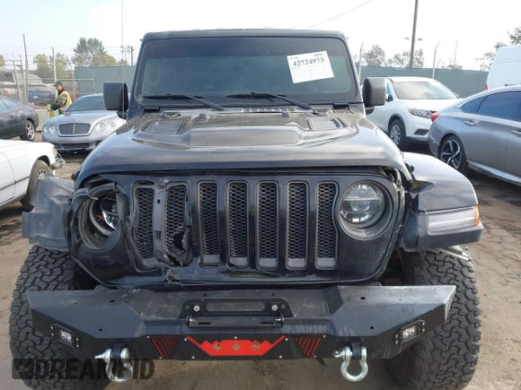2020 Jeep Wrangler Unlimited Rubicon with VIN 1C4HJXFG1LW141335, listed as a IAAI auction lot 42724973 with 59,843 mi miles and . Bid and sale history available at DreamBid. Image 12.