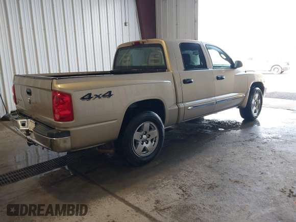 2005 Dodge Dakota Laramie with VIN 1D7HW58N15S159061, listed as a IAAI auction lot 41898306 with 114,288 mi miles and . Bid and sale history available at DreamBid. Image 4.