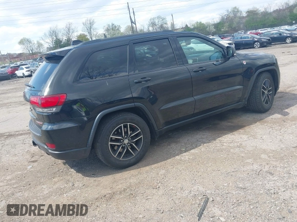 2017 Jeep Grand Cherokee Trailhawk with VIN 1C4RJFLG3HC674489, listed as a IAAI auction lot 42049006 with 91,892 mi miles and . Bid and sale history available at DreamBid. Image 4.