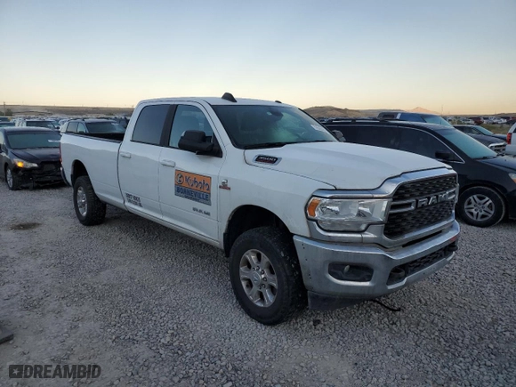 2022 Ram 3500 SLT with VIN 3C63R3HL8NG159507, listed as a Copart auction lot 76596464 with 72,501 mi miles and Salvage Title. Bid and sale history available at carsss.com. Image 4.