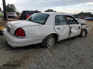 2003 Ford Crown Victoria LX with VIN 2FAFP74W03X158931, listed as a Copart auction lot 71588824 with 165,074 mi miles and Salvage Title. Bid and sale history available at carsss.com. Image 3.