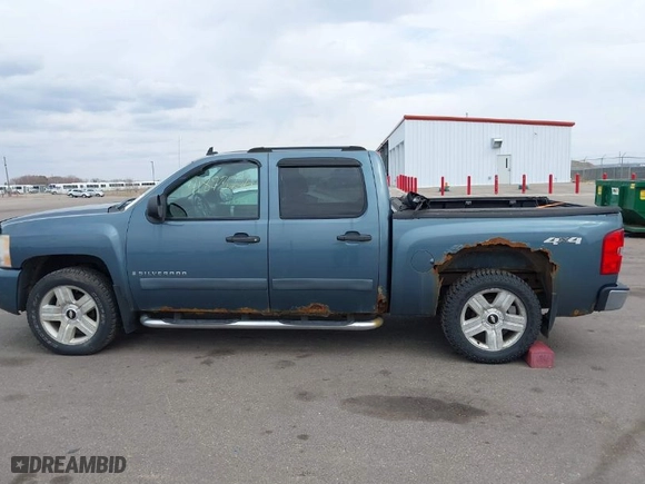 2007 Chevrolet Silverado 1500 LT w/2LT with VIN 2GCEK13M071669436, listed as a IAAI auction lot 41873226 with NaN miles. Bid and sale history available at carsss.com. Image 14.