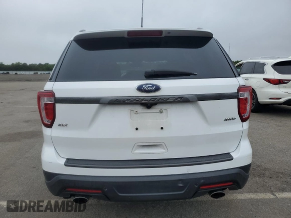 2019 Ford Explorer XLT z VIN 1FM5K8D84KGA57144, wystawiony jako Copart lot #60521115 z przebiegiem 131 517 mil mil oraz Szkoda całkowita • Salvage title. Historia ofert i sprzedaży dostępna na DreamBid. Obrazek 6.