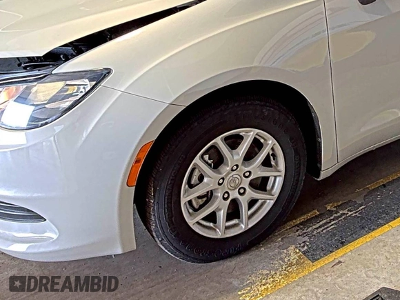 2017 Chrysler Pacifica Touring with VIN 2C4RC1DG5HR764942, listed as a IAAI auction lot 42255421 with 64,381 mi miles and . Bid and sale history available at DreamBid. Image 30.