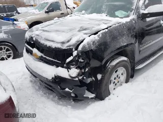 2012 Chevrolet Suburban LTZ with VIN 1GNSKKE75CR215742, listed as a IAAI auction lot 41236729 with 250,634 mi miles. Bid and sale history available at carsss.com. Image 6.