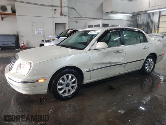 2004 Kia Amanti z VIN KNALD124X45045847, wystawiony jako Copart lot #44620865 z przebiegiem 48 833 mil mil oraz Szkoda całkowita • Salvage title. Historia ofert i sprzedaży dostępna na DreamBid. Obrazek 1.