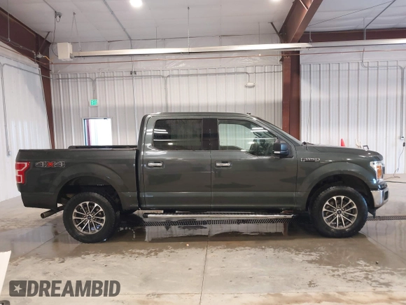 2018 Ford F-150 XL with VIN 1FTEW1EG3JKE52823, listed as a IAAI auction lot 41413009 with 142,057 mi miles. Bid and sale history available at carsss.com. Image 13.