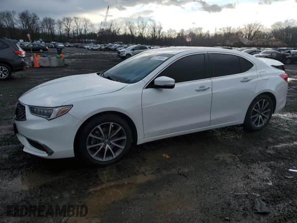 2019 Acura TLX with VIN 19UUB2F31KA001469, listed as a Copart auction lot 82818834 with 64,498 mi miles and Salvage Title. Bid and sale history available at carsss.com. Image 1.