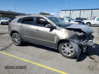 2014 Cadillac SRX z VIN 3GYFNAE37ES609830, wystawiony jako Copart lot #51542955 z przebiegiem 122 560 mil mil oraz Szkody całkowita. Historia ofert i sprzedaży dostępna na DreamBid. Obrazek 4.