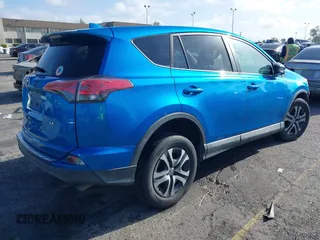 2018 Toyota RAV4 LE with VIN 2T3ZFREV9JW442691, listed as a IAAI auction lot 41946423 with 133,856 mi miles. Bid and sale history available at carsss.com. Image 4.