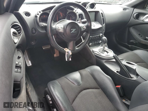 2015 Nissan 370Z Touring z VIN JN1AZ4FH7FM430577, wystawiony jako Copart lot #58711975 z przebiegiem 45 243 mil mil oraz Szkoda całkowita • Salvage title. Historia ofert i sprzedaży dostępna na DreamBid. Obrazek 8.