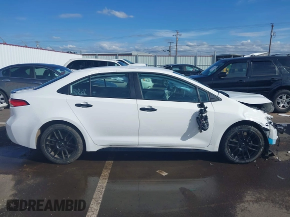 2021 Toyota Corolla SE with VIN 5YFS4MCE9MP090854, listed as a IAAI auction lot 41729865 with 25,216 mi miles. Bid and sale history available at carsss.com. Image 14.