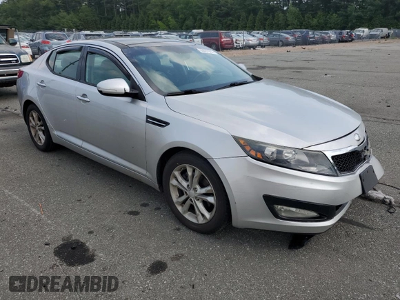 2013 Kia Optima EX z VIN 5XXGN4A79DG217554, wystawiony jako Copart lot #59667065 z przebiegiem 102 482 mil mil oraz Szkoda całkowita • Salvage title. Historia ofert i sprzedaży dostępna na DreamBid. Obrazek 4.