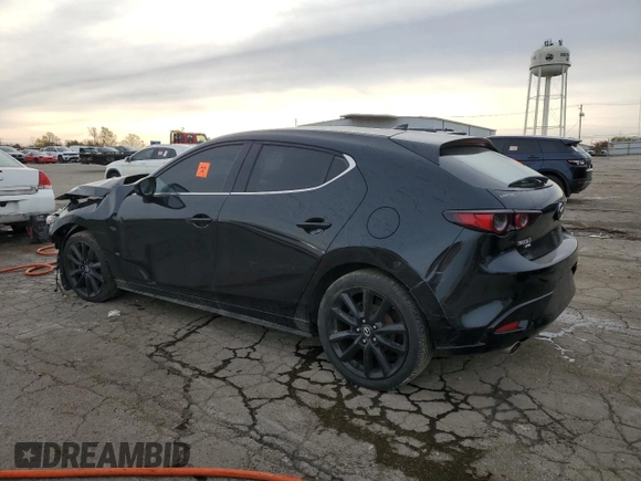 2019 Mazda Mazda3 Hatchback w/Premium Pkg with VIN JM1BPBNM2K1144979, listed as a Copart auction lot 80299074 with 0 mi miles and Clean Title. Bid and sale history available at carsss.com. Image 2.