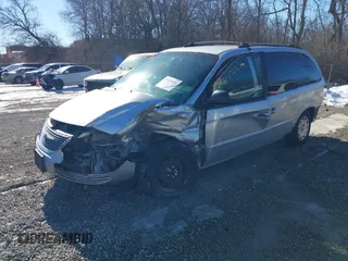 2001 Chrysler Town & Country with VIN 2C8GP44301R304800, listed as a IAAI auction lot 41433836 with Not Provided miles and . Bid and sale history available at DreamBid. Image 2.