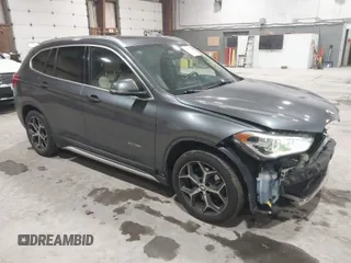 2016 BMW X1 xDrive28i with VIN WBXHT3C3XG5E47536, listed as a IAAI auction lot 41672144 with 97,932 mi miles. Bid and sale history available at carsss.com. Image 1.