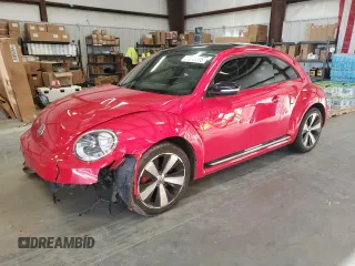 2012 Volkswagen Beetle 2.0T Turbo w/Sun/Snd/Nav PZEV with VIN 3VWVA7AT9CM614435, listed as a Copart auction lot 87645395 with 0 mi miles and Salvage Title. Bid and sale history available at carsss.com. Image 1.