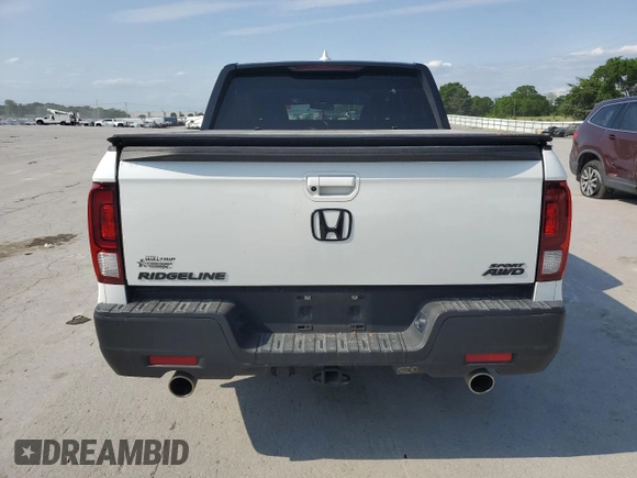 2021 Honda Ridgeline Sport with VIN 5FPYK3F18MB009882, listed as a Copart auction lot 57136205 with 43,549 mi miles and Salvage title. Bid and sale history available at DreamBid. Image 6.