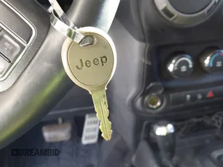 2017 Jeep Wrangler Unlimited Sport with VIN 1C4BJWDG1HL559261, listed as a IAAI auction lot 41367792 with 96,284 mi miles. Bid and sale history available at carsss.com. Image 11.