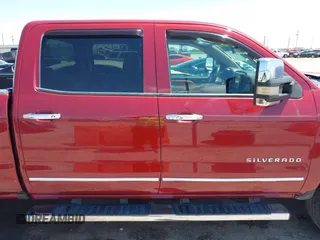 2017 Chevrolet Silverado 1500 LT with VIN 3GCUKREC4HG164281, listed as a IAAI auction lot 42037712 with 133,935 mi miles and . Bid and sale history available at DreamBid. Image 13.