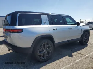 2025 Rivian R1S Adventure z VIN 7PDSGBBA2SN052590, wystawiony jako Copart lot #48431075 z przebiegiem 11 065 mil mil oraz Szkody całkowita. Historia ofert i sprzedaży dostępna na DreamBid. Obrazek 3.