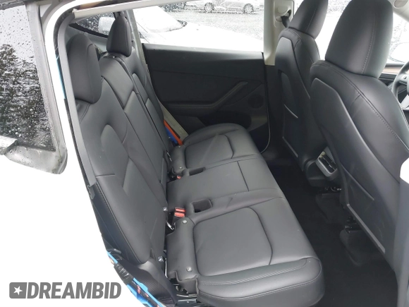 2025 Tesla Model Y Long Range with VIN 7SAYGDEDXSF248734, listed as a IAAI auction lot 41719195 with 5,876 mi miles and . Bid and sale history available at DreamBid. Image 8.