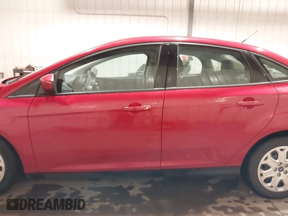 2012 Ford Focus SE z VIN 1FAHP3F21CL114445, wystawiony jako IAAI lot #42277986 z przebiegiem 89 317 mil mil oraz . Historia ofert i sprzedaży dostępna na DreamBid. Obrazek 14.