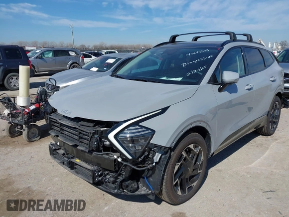 2024 Kia Sportage SX-Prestige with VIN 5XYK53DF3RG233940, listed as a IAAI auction lot 41643523 with 1,018 mi miles and . Bid and sale history available at carsss.com. Image 2.