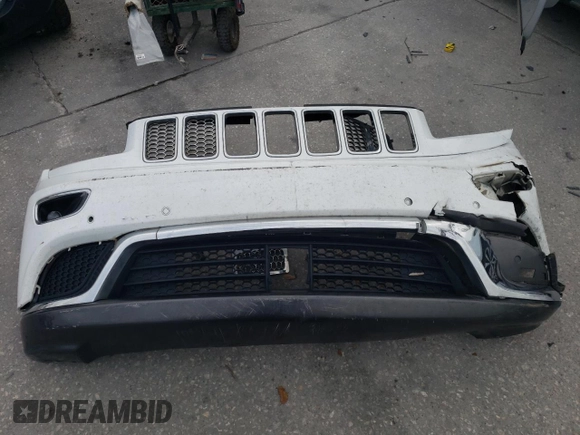 2015 Jeep Grand Cherokee Summit with VIN 1C4RJEJG8FC131925, listed as a Copart auction lot 55270785 with 130,425 mi miles and Salvage title. Bid and sale history available at DreamBid. Image 13.