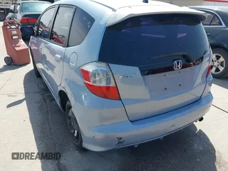 2009 Honda Fit with VIN JHMGE88289S004009, listed as a IAAI auction lot 41803838 with 194,304 mi miles. Bid and sale history available at carsss.com. Image 6.