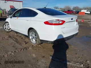 2014 Ford Fusion S with VIN 3FA6P0G78ER298657, listed as a IAAI auction lot 41634724 with Not Provided miles and . Bid and sale history available at carsss.com. Image 3.