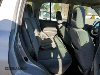 2002 Suzuki Vitara JLS z VIN 2S3TE52V126109079, wystawiony jako Copart lot #41477725 z przebiegiem 147 255 mil mil oraz Szkody całkowita. Historia ofert i sprzedaży dostępna na DreamBid. Obrazek 11.