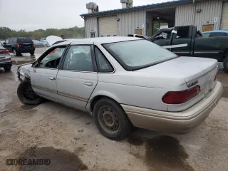 1994 Ford Taurus GL with VIN 1FALP52U0RA251491, listed as a Copart auction lot 71640224 with 0 mi miles and Salvage Title. Bid and sale history available at carsss.com. Image 2.