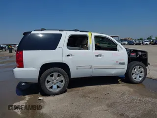 2011 GMC Yukon SLT z VIN 1GKS1CE00BR210794, wystawiony jako IAAI lot #41958998 z przebiegiem 225 407 mil mil oraz . Historia ofert i sprzedaży dostępna na DreamBid. Obrazek 6.