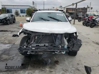 2015 Jeep Grand Cherokee Overland with VIN 1C4RJECG7FC872175, listed as a Copart auction lot 50653205 with 117,433 mi miles and Salvage title. Bid and sale history available at DreamBid. Image 5.