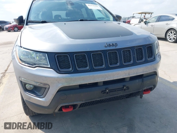 2018 Jeep Compass Trailhawk z VIN 3C4NJDDB5JT451192, wystawiony jako IAAI lot #42378382 z przebiegiem 132 667 mil mil oraz . Historia ofert i sprzedaży dostępna na DreamBid. Obrazek 6.
